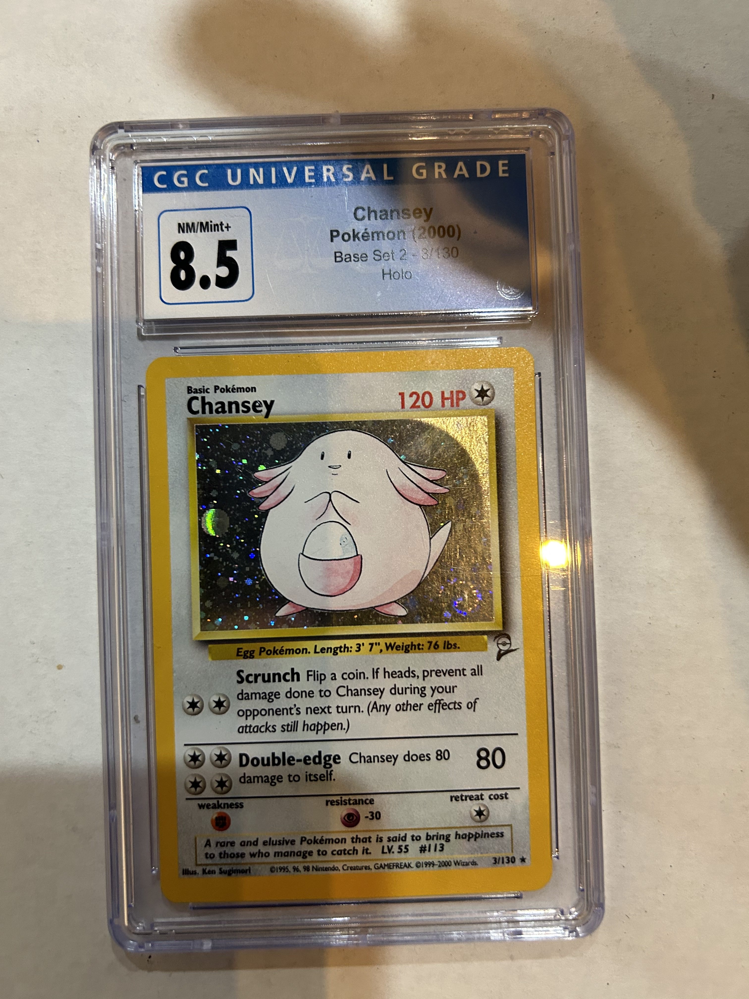 CGC - 8.5 Chansey Pokemon (2000) Base Set 2 - 3/130 Holo